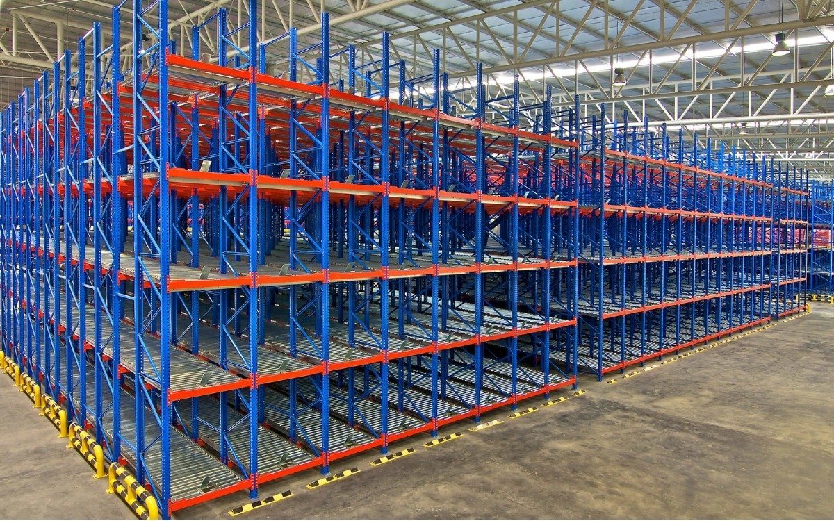 Multi-level rack-supported gravity flow storage structure