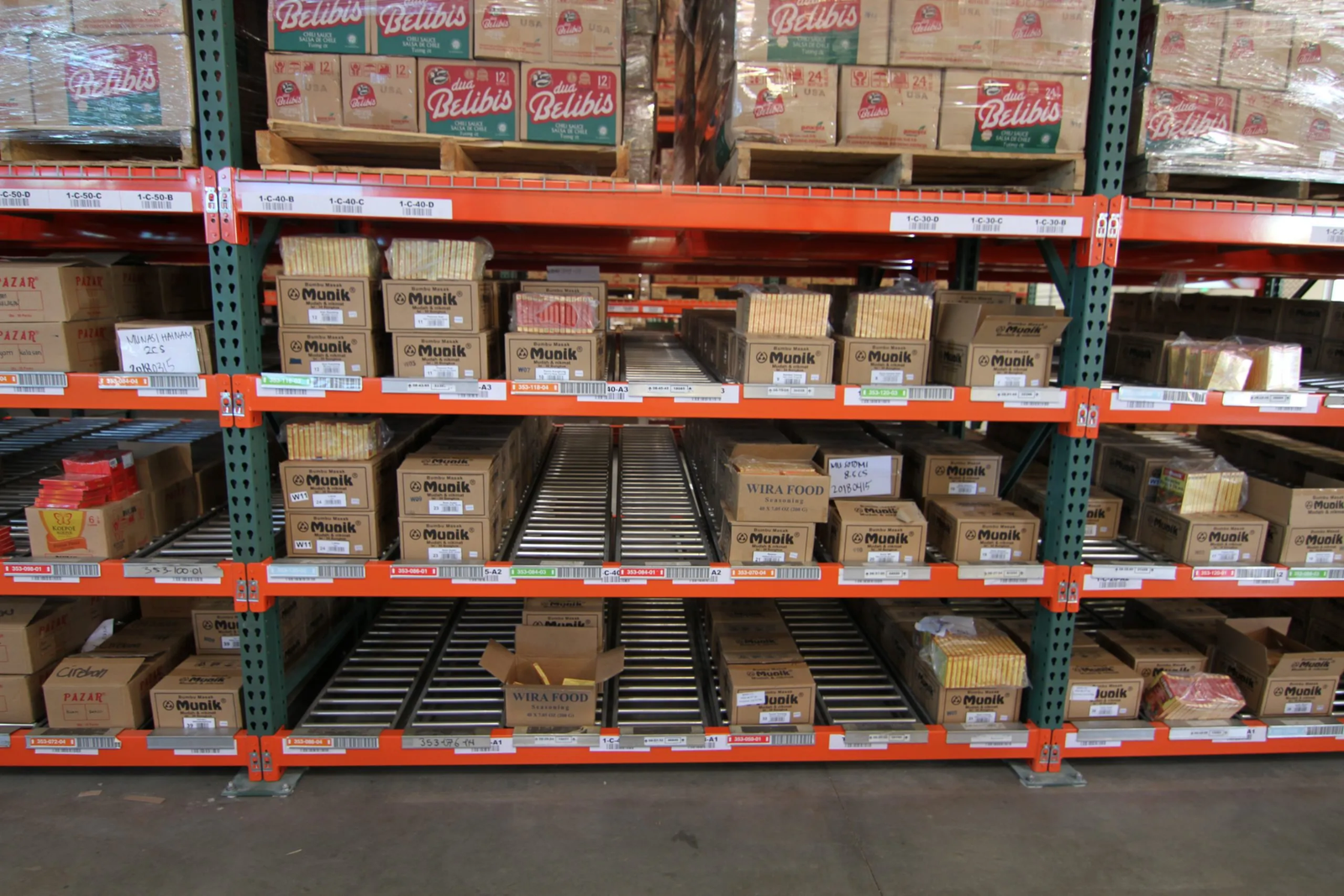 High-density warehouse shelving organized for small cartons and high-SKU electronics inventory
